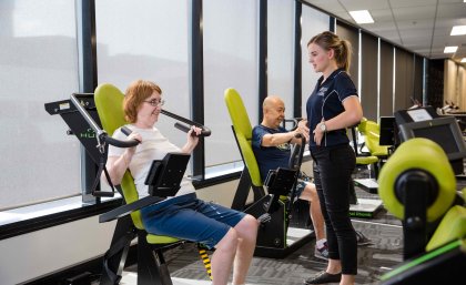 UQ Master of Clinical Exercise Physiology student practitioner Kristin Murray works with Emeritus Professor Tian Po Oei and his wife Elizabeth at UQ Healthy Living. UQ Master of Clinical Exercise Physiology student practitioner Kristin Murray works with Emeritus Professor Tian Po Oei and his wife Elizabeth at UQ Healthy Living.